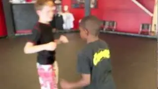 Alan Belcher MMA Club: Chaos Kids- Quinten demonstrates arm bar off of the double leg