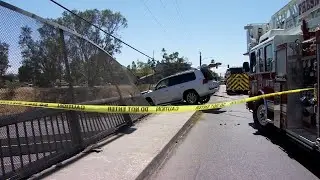 Driver rescued from crashed car dangling over Highway 99 in Fresno
