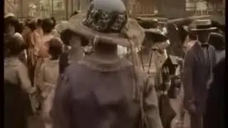 New Orleans 1915 - people walking on crowded sidewalk Colorized