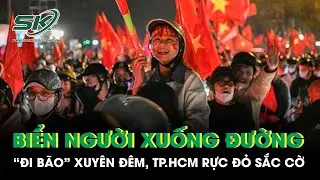 Biển người đổ xuống đường “đi bão” xuyên đêm, khắp ngả đường TP.HCM rực đỏ sắc cờ