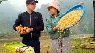 The soldier and the girl together threw corn and caught fish in the pond.