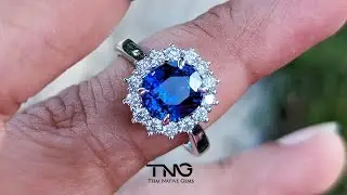 GIA certified 2.64 Carats Vivid Royal Blue Sapphire and Diamond Halo 18K White Gold Engagement Ring