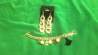 A set of jewelry earrings and bracelet of large links, color - silver