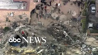 Families cling to hope as rescue workers race against time after building collapse
