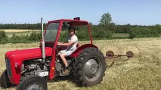 Raking hay with Vicon Acrobat and Massey Ferguson 35.