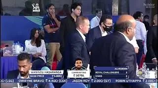 IPL Auctioneer Hugh Edmeades falls from the stage.