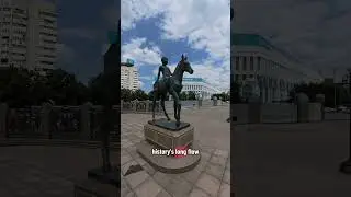A Glimpse of the Independence Monument in Almaty, Kazakhstan