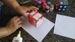 Dado com caixa de leite