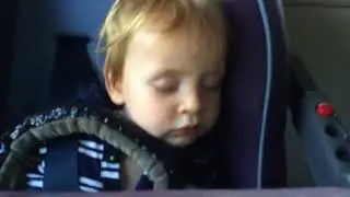 Gabriel asleep in the car