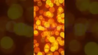 Golden Yellow and Orange Bokeh Lights Background stock footage | stock video | Cinefootage