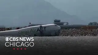 2 dead when cargo plane skids off runway in Hong Kong