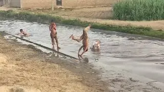 Kids Bath In Canal Water | Mud Sliding Fun | Village Kids Enjoying Summer