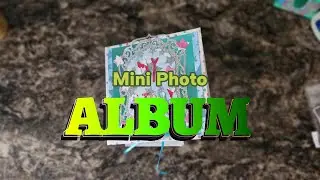 This mini photo album has more layers than you'd expect