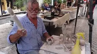 Israeli Man singing Raj Kapoor song मेरा जूता है जापानी in Tel Aviv famous street and Art market.