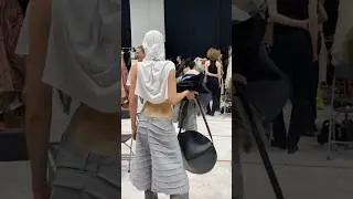 BACKSTAGE AT FASHION SHOW