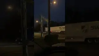 A Freightliner with a dry van