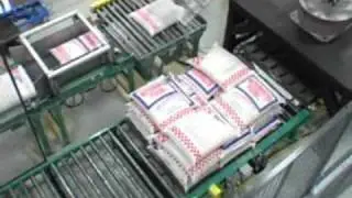 Motoman Robots Handling Bags of Livestock Feed