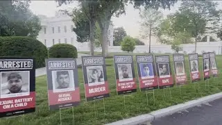 White House lines driveway with posters of alleged undocumented migrants