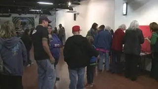 Dozens gather for fundraising event held to benefit homeless children