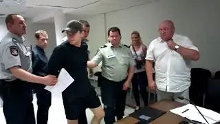 Prisoners handcuffed in court