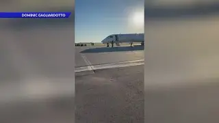 Emergency landing at Lambert Airport, flight returns due to smoke alert