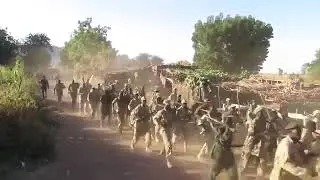SPLA IO  somewhere in Sudan training their troops for the intention to matching Juba