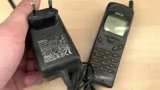 Nokia 3110 type NHE-8 retro style mobile cellphone from pre-smartphone period with charger test