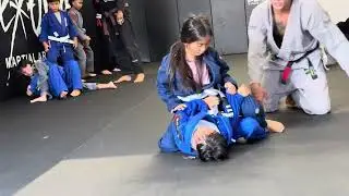 3/12/25. Lanvy (in Gray) vs. a bigger boy (in Blue).
