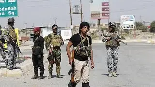 Shi'ite militia and Iraqi troops continue push for Tikrit