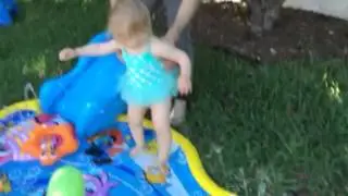 Playing with the Banzai baby sprinkles water park