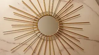 DIY sunburst mirror with paper straws.