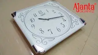 Ajanta Analog 25.3 cm X25.3cm Wall clock (White With Glass)