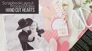 Hand cut hearts and the scrapbook layout. Celebrating Valentines Day on a page layout...
