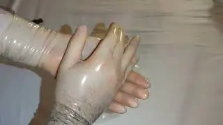 Transparent latex fetish gloves