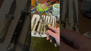 Антикварный итальянский складной нож с деревянной рукояткой.