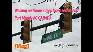 Walking on NoonsCreekDrive in PoMo BC Canada