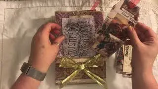 Traditional Christmas stuffed paper bags with journals and ephemera