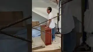 Watch a 69 year old Move a Bookshelf the Hard Way