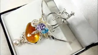 Gregory Pyra Piro, handgemaakte sieraden, hanger met fiets, uniek design, detail van vakmanschap