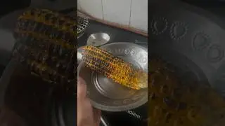 My little helper in kitchen making a spicy corn fry in rainny evening