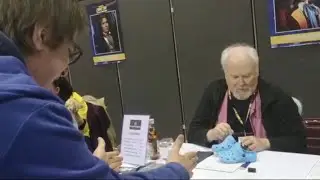 Getting Colin Baker to sign crocs