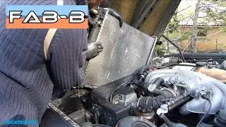 Comment démonter le radiateur du moteur sur BMW 325i E30