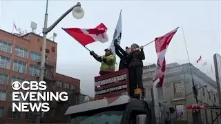 Canadian truckers defy calls to end protest over COVID restrictions