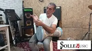 How to play a slap sound on the darbuka?