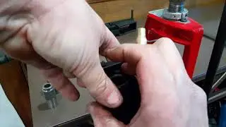Setting size die for AR type rifle.