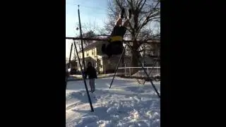 Paul jumping off swing set #4