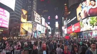 SLOW MOTION: Times Square Lights at Night with Traffic, Cars and people passing