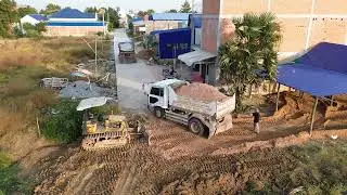 Mitsubishi Dozer Pushing Land In To The House And 5Ton Dump Truck Unloading