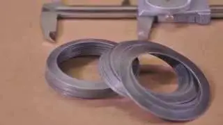 Servo press stamping a belleville washer (by Scandic, California USA)
