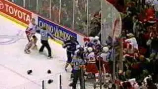 Hasek hit by Tkachuk